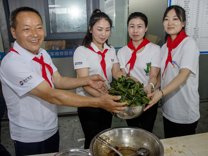 环宇汽车“粽情端午”包粽子比赛